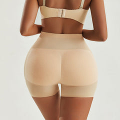 Women's versatile body shaping high waisted compression pants in apricot color.